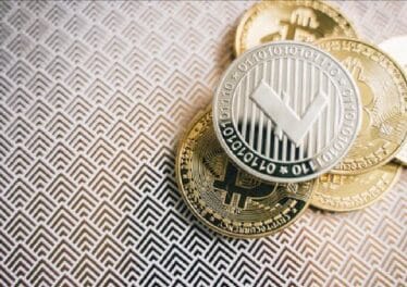 How do Blockchains prevent double-spending of Bitcoins?
